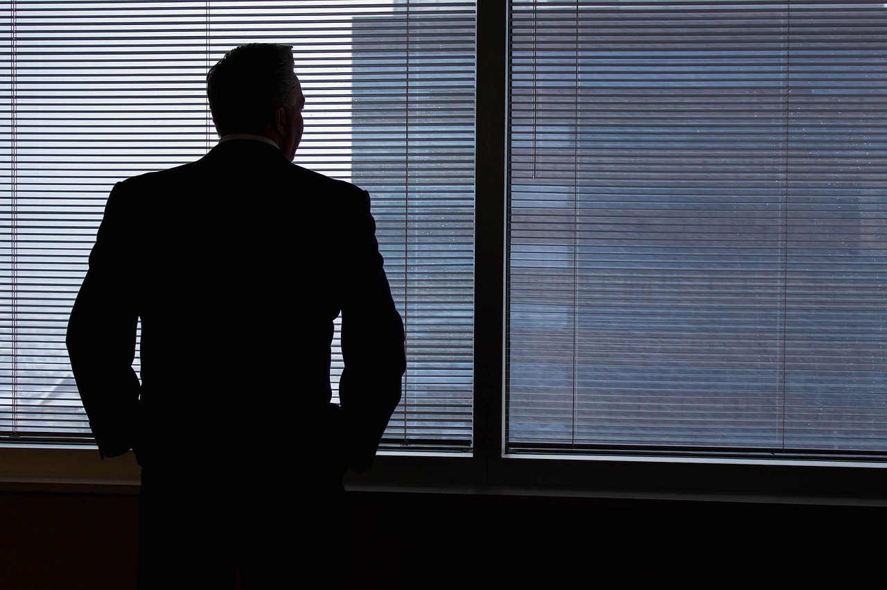 Businessman, silhouette, windows — MT4 for MacOS: Features and Compatibility Overview
